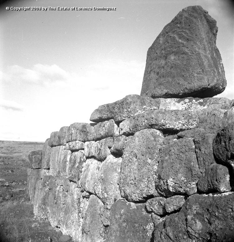 TAM_Ahu_02.jpg - Easter Island. 1960. Rests of a moai on the wall of ahu Tongariki. Photograph taken shortly before the destruction of the ahu by the tsunami of May 22, 1960.
